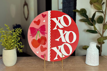 Valentine's Day XOXOXO Door Hanger SVG | Heart-Shaped Cherries with Bow | Laser Cut File with Scalloped Edge | DIY Valentine Decor