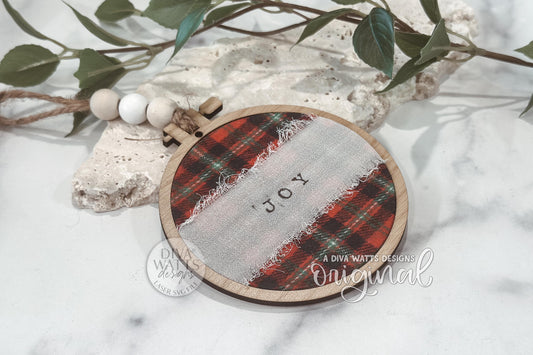 Digital SVG file for laser cutting a Christmas embroidery hoop ornament. Instant download includes a hoop cut file only, ready to use with Glowforge, xTool, OMTech, and more. Layer fabric, ribbon, or paper between the hoop pieces to create endless custom designs. Add beads and jute for a rustic finish. Digital file only—no physical product shipped. Perfect for DIY Christmas décor, tree ornaments, or craft fair resale.