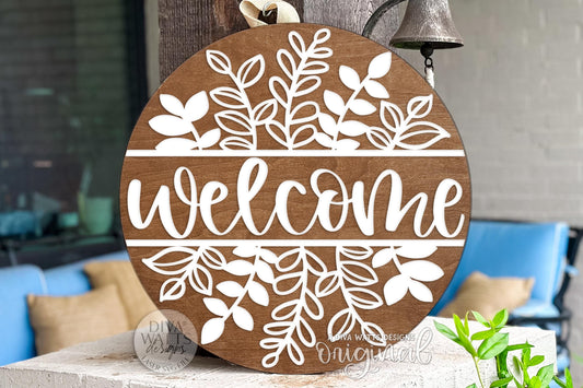 Digital SVG file for laser cutting a layered round “Welcome” door hanger with leafy farmhouse accents. Instant download includes multiple formats for Glowforge, xTool, OMTech, and more. Perfect for crafting an everyday front porch sign, this design can be cut and assembled with your own wood, paint, and materials. Works beautifully for rustic farmhouse décor, craft fairs, or personalized gifts. Digital file only—no physical product shipped.