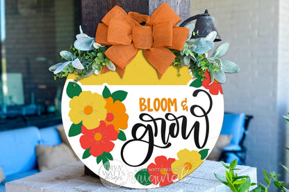 Digital SVG file for a Bloom & Grow round door hanger laser cut design with layered spring flowers and bold script lettering. This instant download includes a laser-ready SVG and multiple file formats for laser machines. Create your own DIY round door hanger, spring porch décor, or inspirational sign using this digital file. No physical sign included—this digital laser cut design allows full customization of colors, size, and finish for a bright, uplifting home décor project.