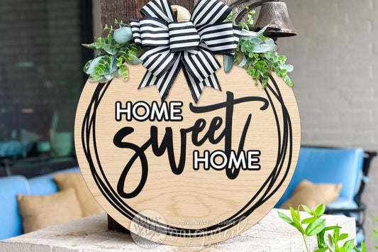 Digital SVG file of a Home Sweet Home round door hanger laser cut design, delivered as an instant download. This DIY sign SVG is made for laser cutting and layering to create your own round door hanger or porch décor. The digital file includes clean vector layers for wood signs and front door projects. Create a custom welcome sign using this laser cut design with your preferred materials and finishes.