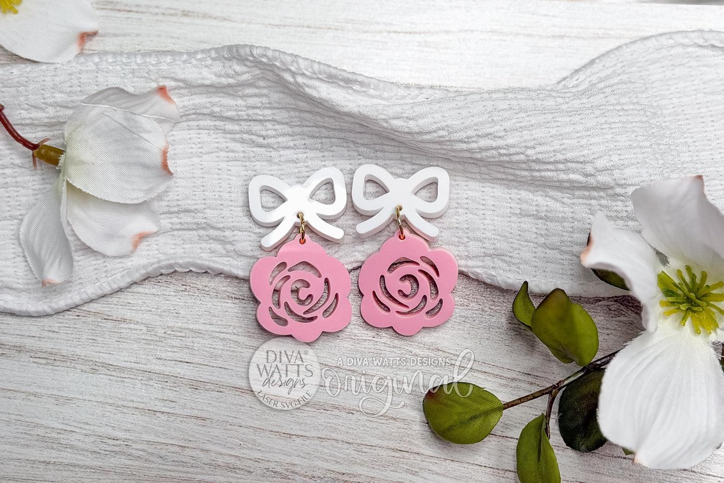 Digital SVG file of laser cut earrings featuring a bow-shaped top with a dangling rose flower design. This fast and easy earring SVG cuts in under one minute on an xTool P2S and is designed for clean, simple laser cutting from wood, acrylic, or leather. Ideal for quick batch production, DIY laser earrings, boutique jewelry lines, and craft fair sellers. Digital SVG file only.