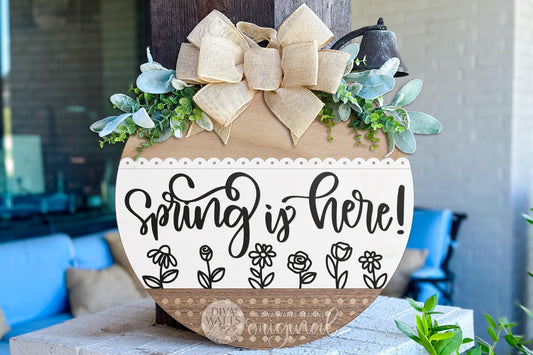 Digital SVG file for a round “Spring Is Here” floral door hanger designed for laser cutting and instant download. This digital laser cut design lets you create your own DIY spring porch sign with layered flowers and text. Finished sign photos are examples only; no physical item is included. Ideal for seasonal porch décor, round door hangers, and customizable spring laser projects.