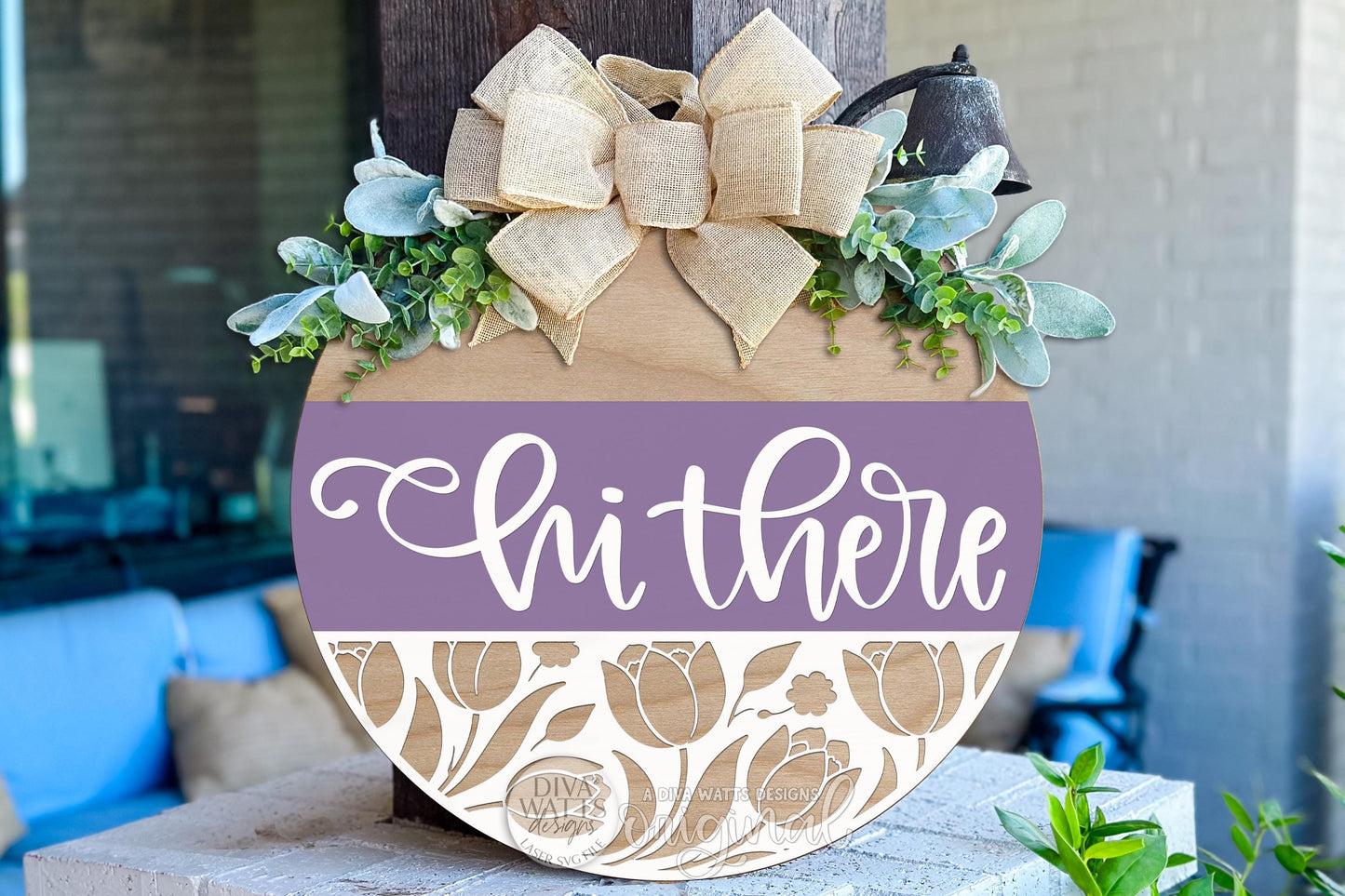 Digital SVG file instant download of a Hi There round door hanger laser cut design with tulip floral cutout detail. This digital laser cut design is ideal for DIY porch décor, spring signs, and custom round door hangers created using your laser machine.