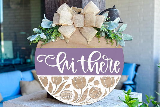 Digital SVG file instant download of a Hi There round door hanger laser cut design with tulip floral cutout detail. This digital laser cut design is ideal for DIY porch décor, spring signs, and custom round door hangers created using your laser machine.