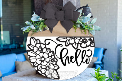 Digital SVG file for a floral round door hanger with a split design and “hello” script. This instant download laser cut design is made for DIY front door and porch décor projects. The SVG digital file allows makers to create a custom round door hanger using their own materials, paint, and finishes. Perfect for laser cutting, crafting seasonal or everyday signs, and creating personalized porch décor with Glowforge or other laser machines.