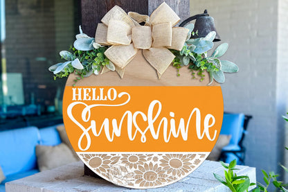 Digital SVG file instant download of a Hello Sunshine round door hanger laser cut design with sunflower cutout detail. This digital laser cut file allows you to create your own summer porch décor, DIY round sign, or seasonal door hanger using a laser machine.