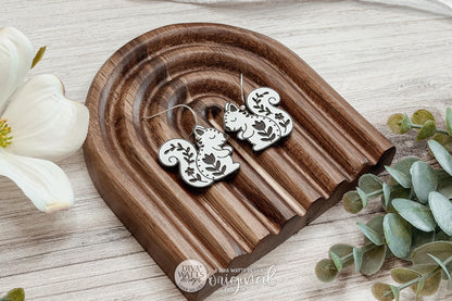 Digital SVG File for Laser Cut Folk Art Squirrel Dangle Earrings, Instant Download for Glowforge and xTool, Cottagecore Woodland Animal Boutique-Style Earring Design Featuring a Whimsical Floral Squirrel by Diva Watts Designs