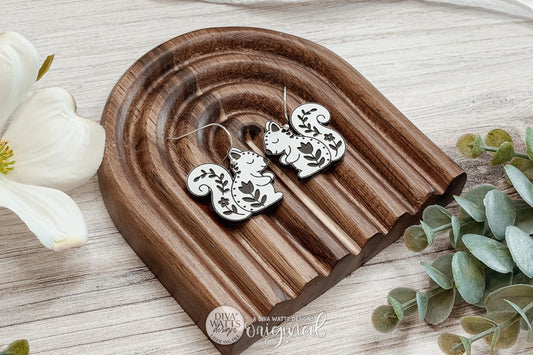 Digital SVG File for Laser Cut Folk Art Squirrel Dangle Earrings, Instant Download for Glowforge and xTool, Cottagecore Woodland Animal Boutique-Style Earring Design Featuring a Whimsical Floral Squirrel by Diva Watts Designs