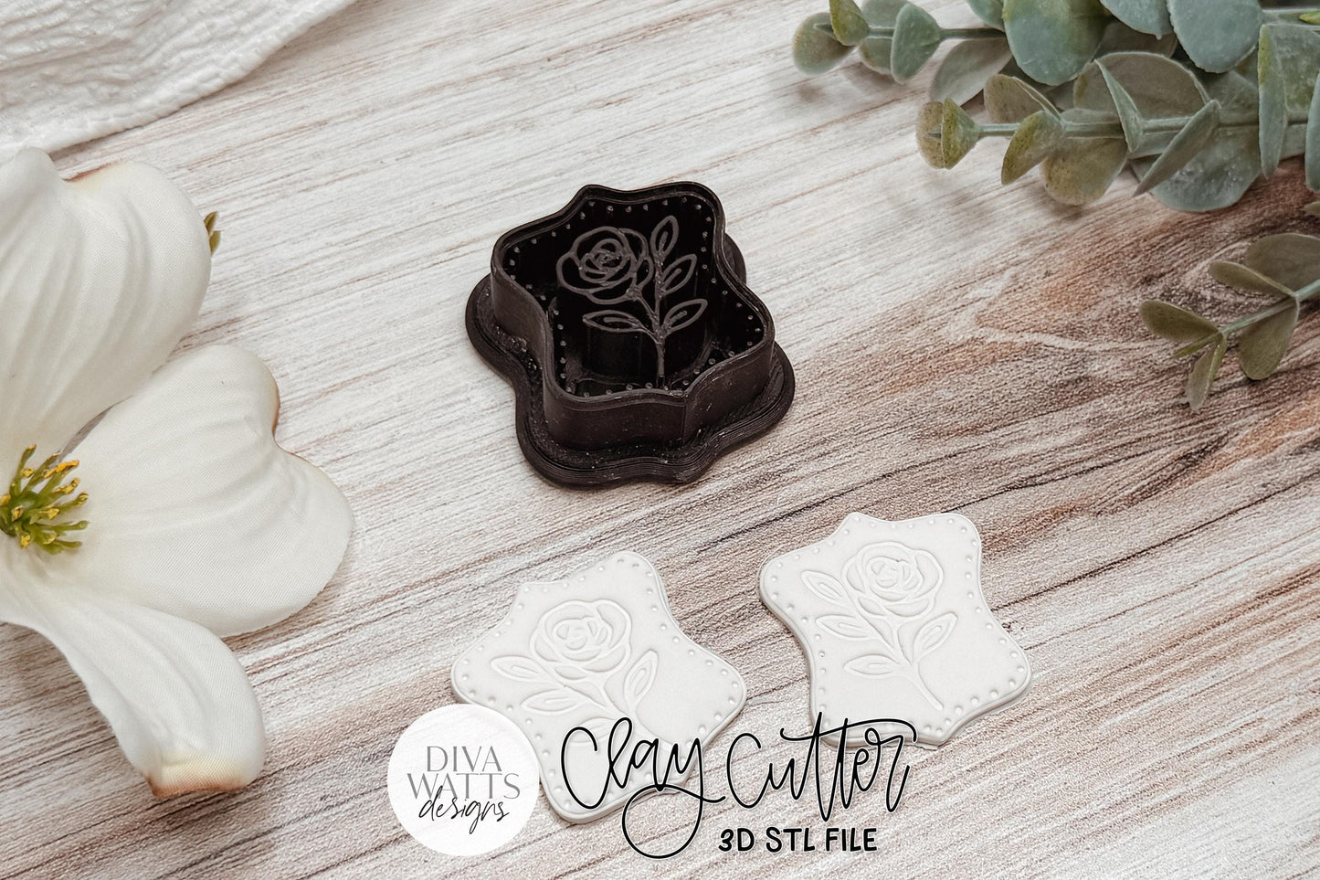 Scalloped Rose Plaque Clay Cutter STL for Polymer Clay Earrings Featuring an Elegant Rose Design Inside a Decorative Scalloped Plaque. Sharp-Edge Cutter for Crisp, Clean Results. Approximate Cutter Size 1.6 Inch W x 1.7 Inch H. Perfect for Boutique, Cottagecore, and Floral Handmade Jewelry.