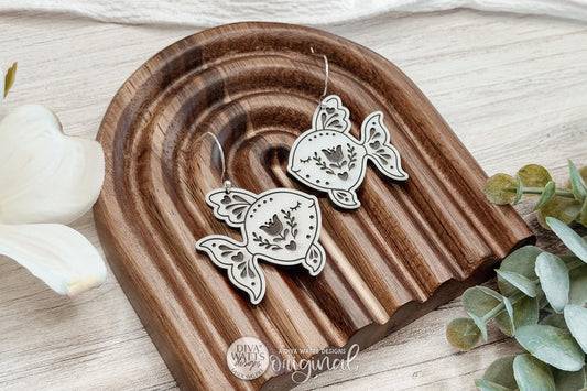 Digital SVG File for Laser Cut Folk Art Fish Dangle Earrings, Instant Download for Glowforge and xTool, Boutique-Style Earring Design Featuring Whimsical Floral Fish, Scandinavian Inspired Ocean Earrings by Diva Watts Designs